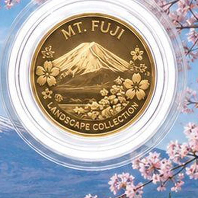 Close-up of the encapsulated gold round showing Mt. Fuji in relief